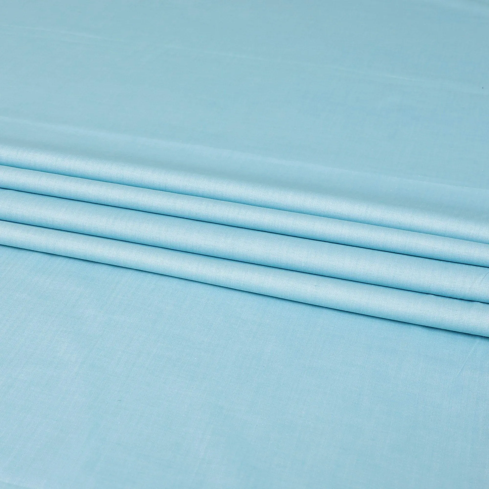 Light tiffany blue Italian 100% cotton shirting fabric in self design-D7100