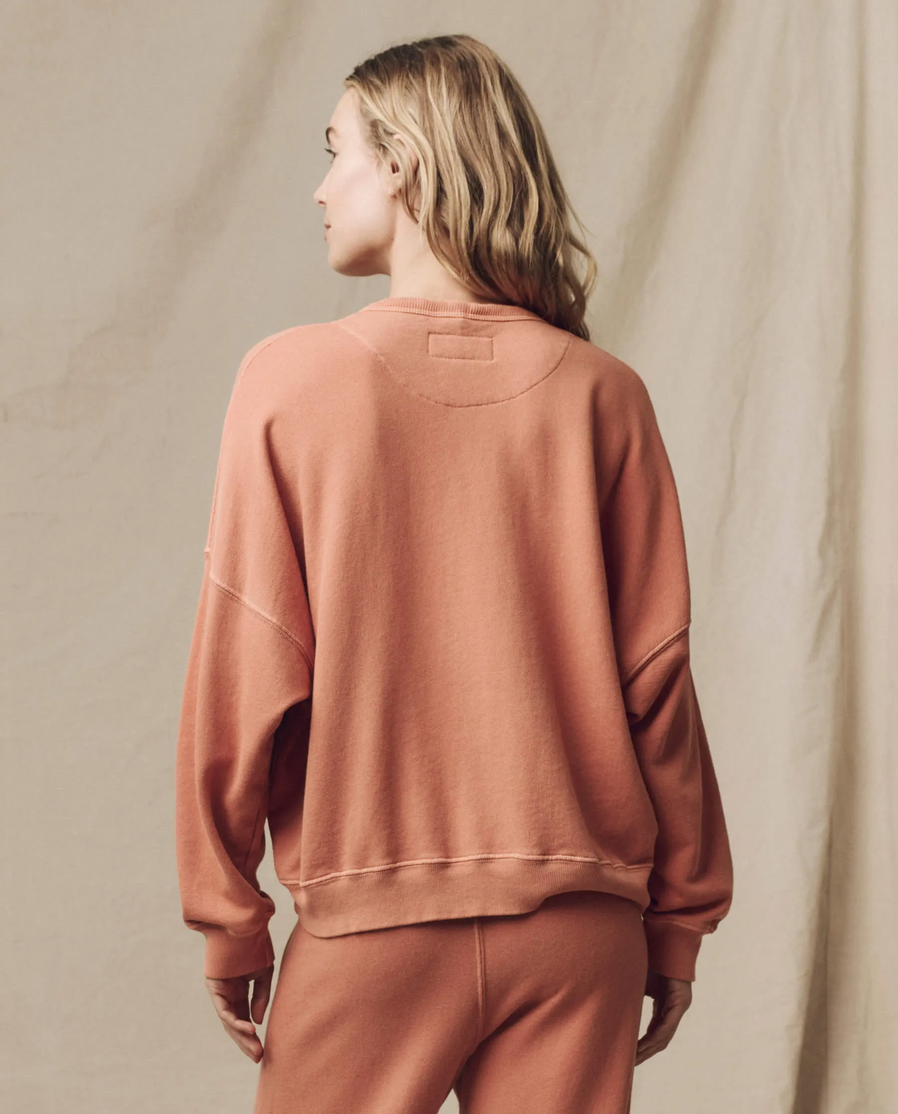 The Teammate Sweatshirt. Solid -- Sun Dried Orange